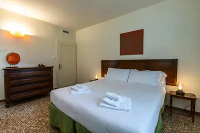 Letto o letti in una camera di Riva De Biasio Charming Apartment
