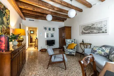 Area soggiorno di Riva De Biasio Charming Apartment