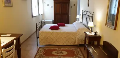 Letto o letti in una camera di B&B Relief