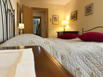 Letto o letti in una camera di B&B Relief