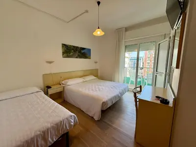 Letto o letti in una camera di Hotel Palme