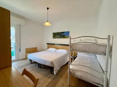 Letto o letti in una camera di Hotel Palme