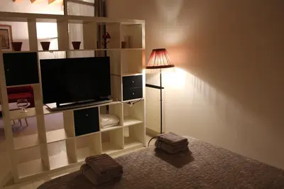 TV o dispositivi per l'intrattenimento presso Tre Archi Garden Apartment