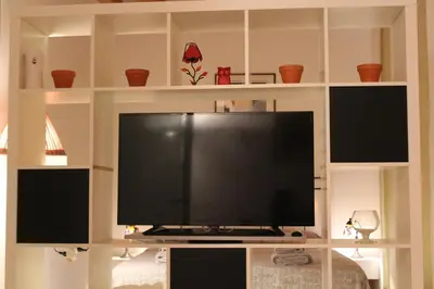 TV o dispositivi per l'intrattenimento presso Tre Archi Garden Apartment