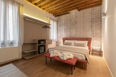 Letto o letti in una camera di La Finestra sulle Beccarie