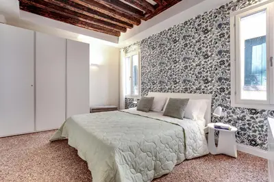 Letto o letti in una camera di Rugabella Rialto Deluxe by Wonderful Italy