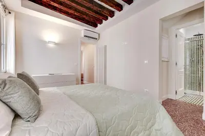 Letto o letti in una camera di Rugabella Rialto Deluxe by Wonderful Italy
