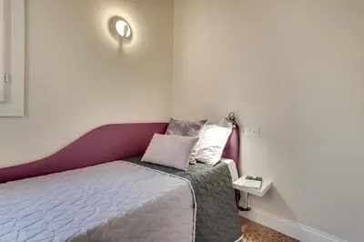 Letto o letti in una camera di Rugabella Rialto Deluxe by Wonderful Italy