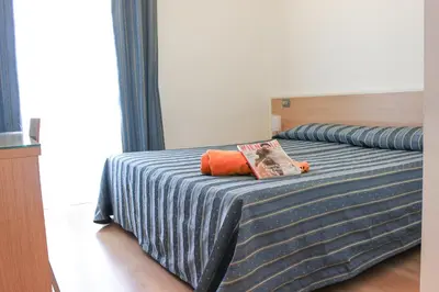 Letto o letti in una camera di Aparthotel Royal