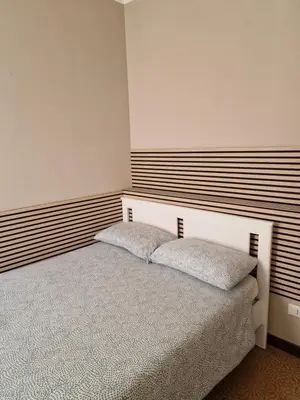 Letto o letti in una camera di San Pietro Apartment