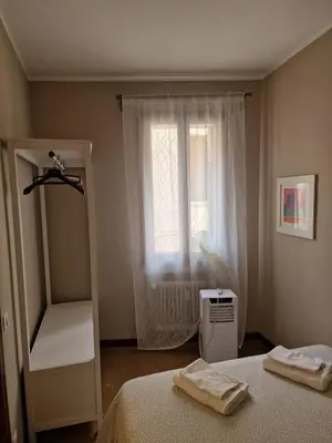 Letto o letti in una camera di San Pietro Apartment