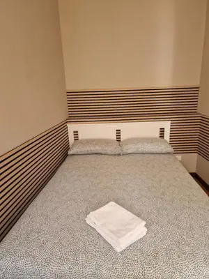 Letto o letti in una camera di San Pietro Apartment