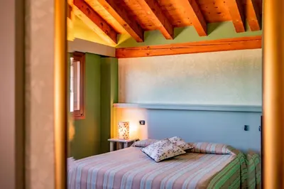 Letto o letti in una camera di Agriturismo Roccat