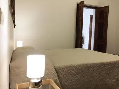 Letto o letti in una camera di Uma Apartments