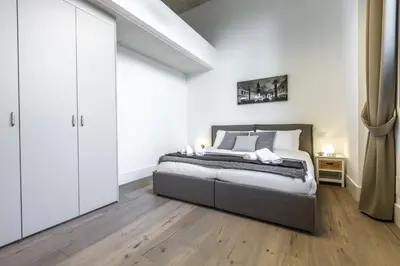 Letto o letti in una camera di Elegant Fornasa Vecia, canal view with a beautiful garden R&R