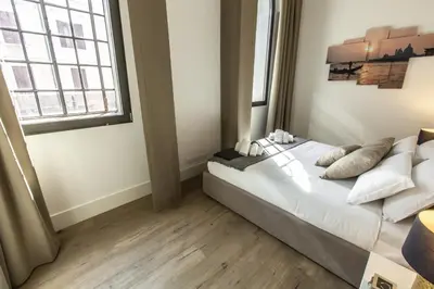 Letto o letti in una camera di Elegant Fornasa Vecia, canal view with a beautiful garden R&R