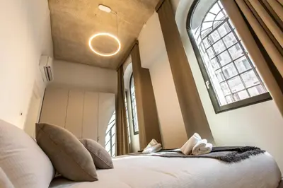 Letto o letti in una camera di Elegant Fornasa Vecia, canal view with a beautiful garden R&R