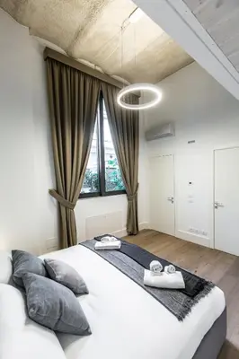 Letto o letti in una camera di Elegant Fornasa Vecia, canal view with a beautiful garden R&R