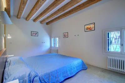 Letto o letti in una camera di GrandCanal-Red