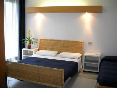 Letto o letti in una camera di Hotel Rosmary