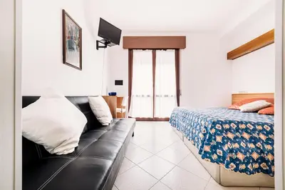Letto o letti in una camera di Hotel Rosmary