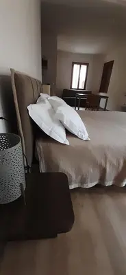 Letto o letti in una camera di La Mansardina del Giardinetto