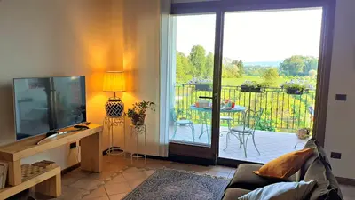 TV o dispositivi per l'intrattenimento presso Le Vigne di Annalisa Sweet Relax Rooms in Unesco Prosecco D.o.c.g.