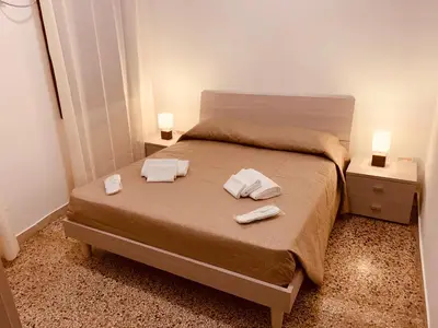 Letto o letti in una camera di Stefano's sweet home