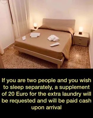 Letto o letti in una camera di Stefano's sweet home