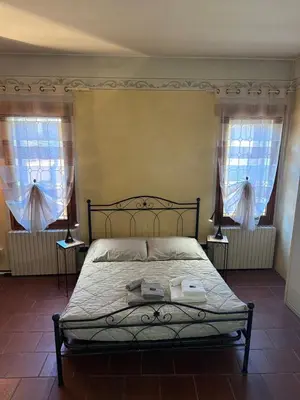 Letto o letti in una camera di La Suite del Doge - Parking