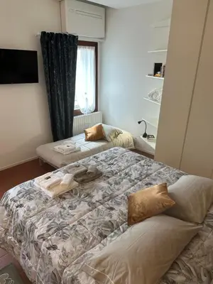 Letto o letti in una camera di La Suite del Doge - Parking