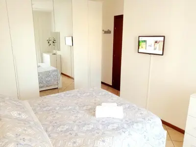 Letto o letti in una camera di Casa Roberto