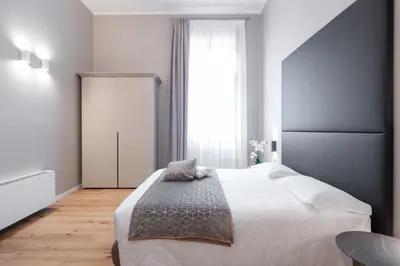 Letto o letti in una camera di Hotel Palazzo Martinelli Dolfin