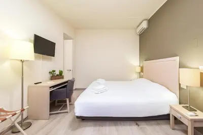 Letto o letti in una camera di Casanova ai Tolentini