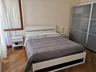 Letto o letti in una camera di PATAVIUM APARTMENT