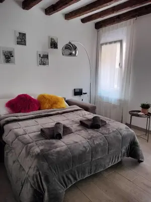 Letto o letti in una camera di Design House alla Biennale