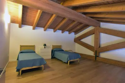 Letto o letti in una camera di Tenuta Monterosso