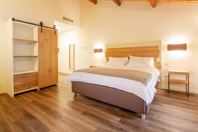 Letto o letti in una camera di AGRITURISMO LA CAMPAGNOLA