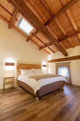 Letto o letti in una camera di AGRITURISMO LA CAMPAGNOLA