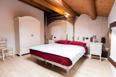 Letto o letti in una camera di ALLOGGI G e G