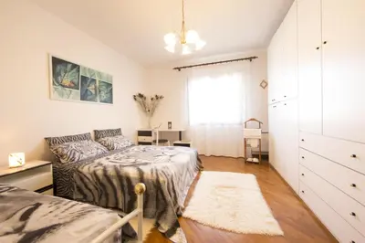 Letto o letti in una camera di B&B Le Tre Grazie