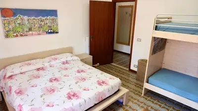Letto o letti in una camera di VILLA CRISTINA N.6