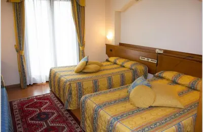 Letto o letti in una camera di Hotel Piroga Padova