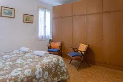 Letto o letti in una camera di Renato House