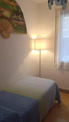 Letto o letti in una camera di Renato House
