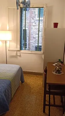 Letto o letti in una camera di Renato House