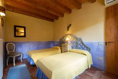 Letto o letti in una camera di Rosalimone B&B