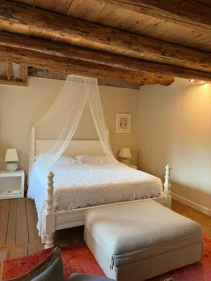 Letto o letti in una camera di Casa Augusta