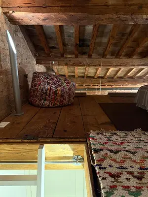 Letto o letti in una camera di Casa Augusta
