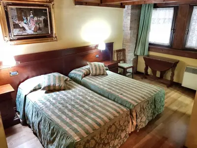 Letto o letti in una camera di Barchessa Contarini